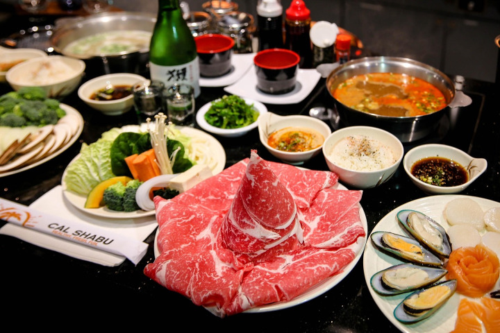 paper thin raw marbled shabu shabu beef slices